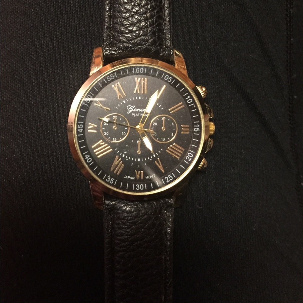 Black and gold leather watch